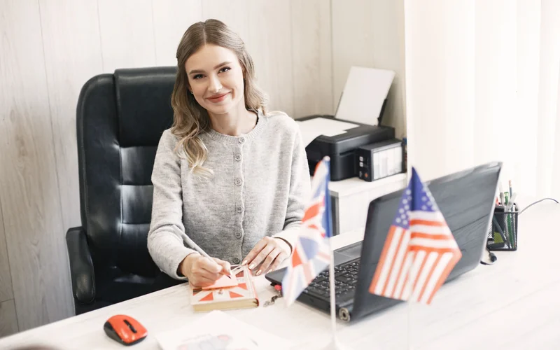 BMG Money federal employee loans LoansForFeds professional US flags desk